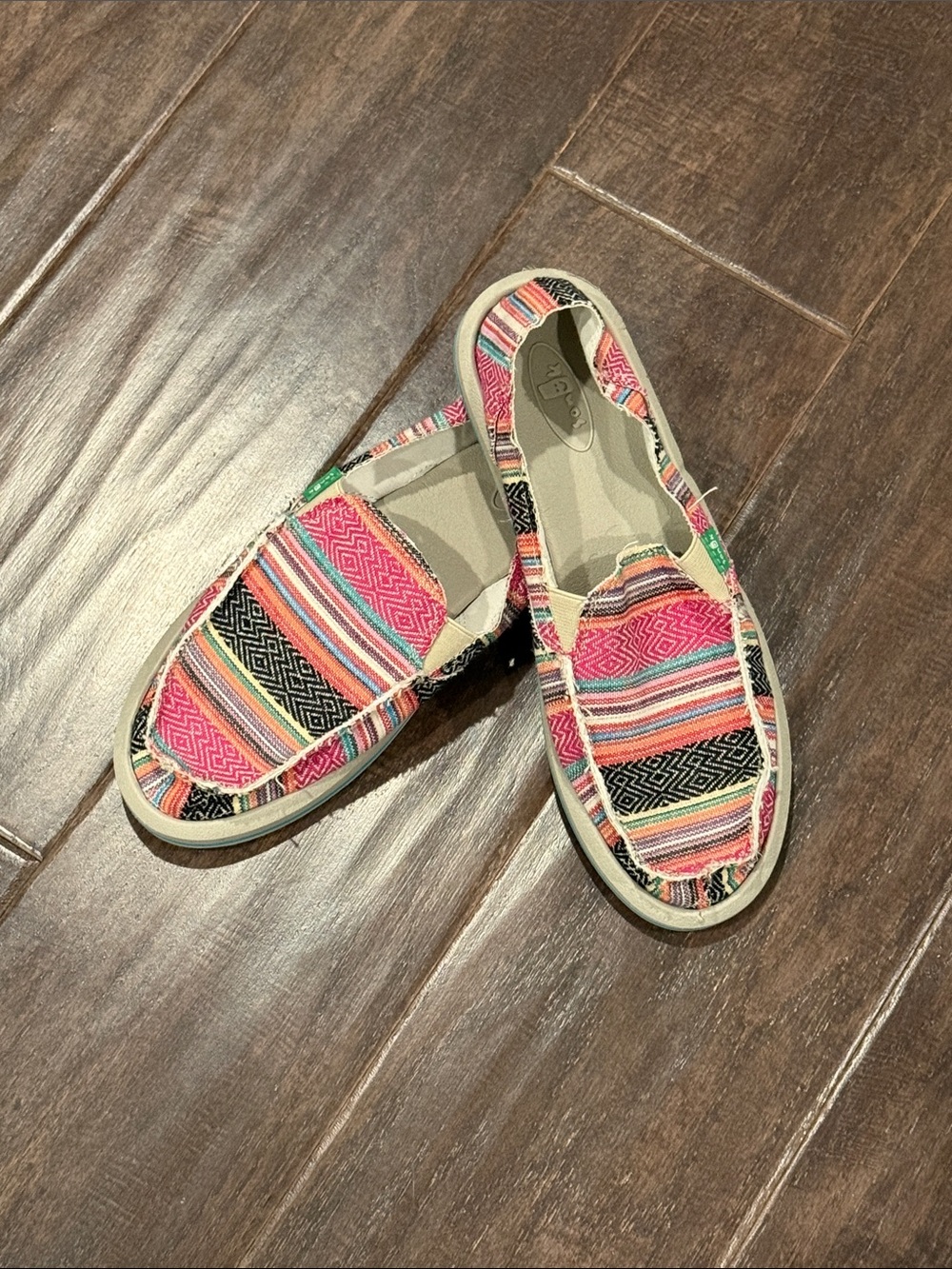 Sanuk Women's Multicolor Striped Canvas Slip-Ons with Pink and Black Accents